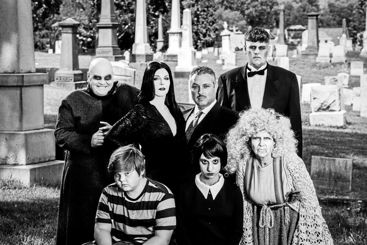 Photos by Lüke Haughwøut and Mandi Martini. The Addams Family: front row, from left, Colby Morkan (Pugsley), Sydney Weiser (Wednesday), Susan Hackel (Grandma); back row, from left, Josh Newey (Uncle Fester), Katherine Ray (Morticia), John Farias (Gomez) and Peter Bard (Lurch).