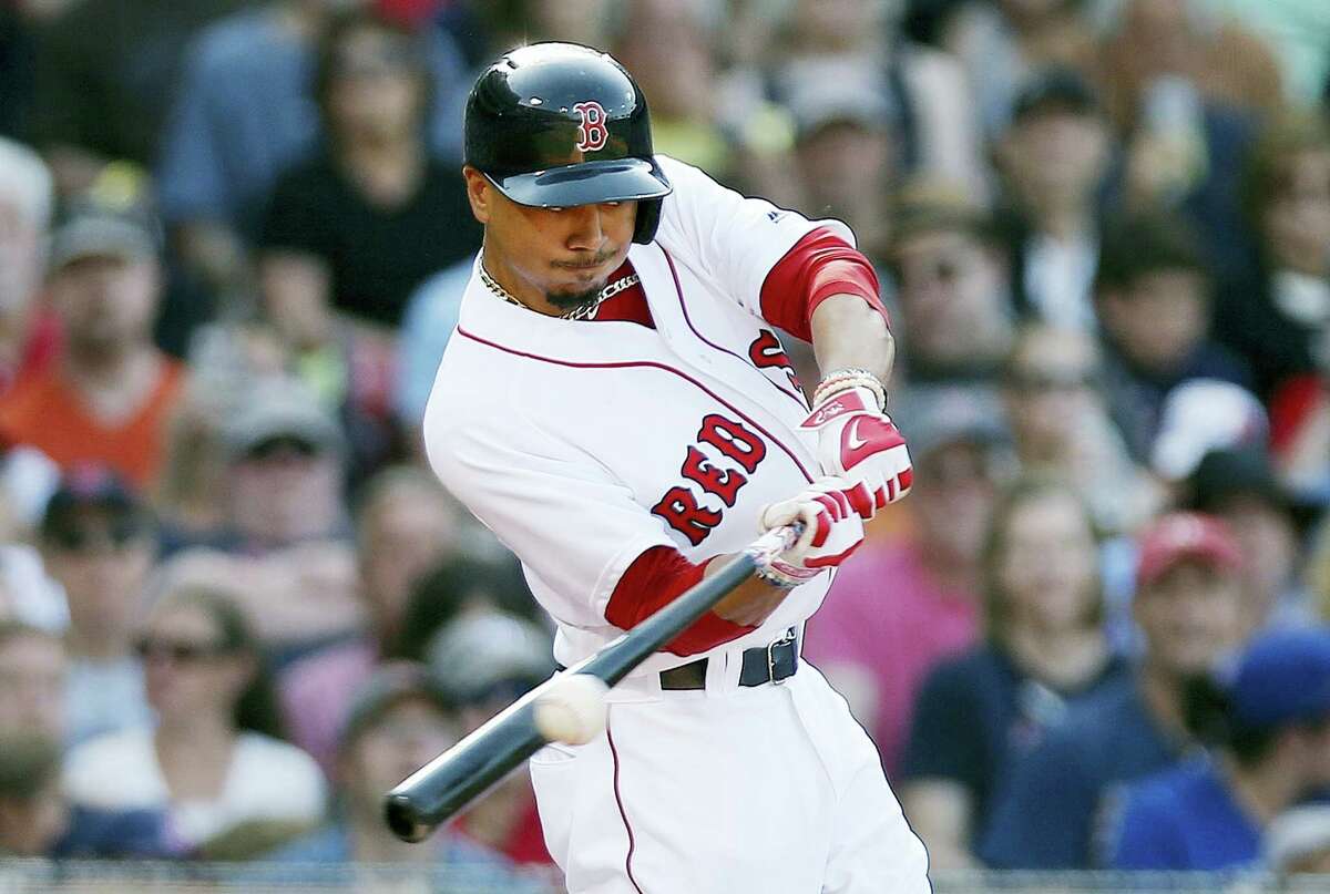 Mookie Betts connects on an RBI-single during the fourth inning Saturday.