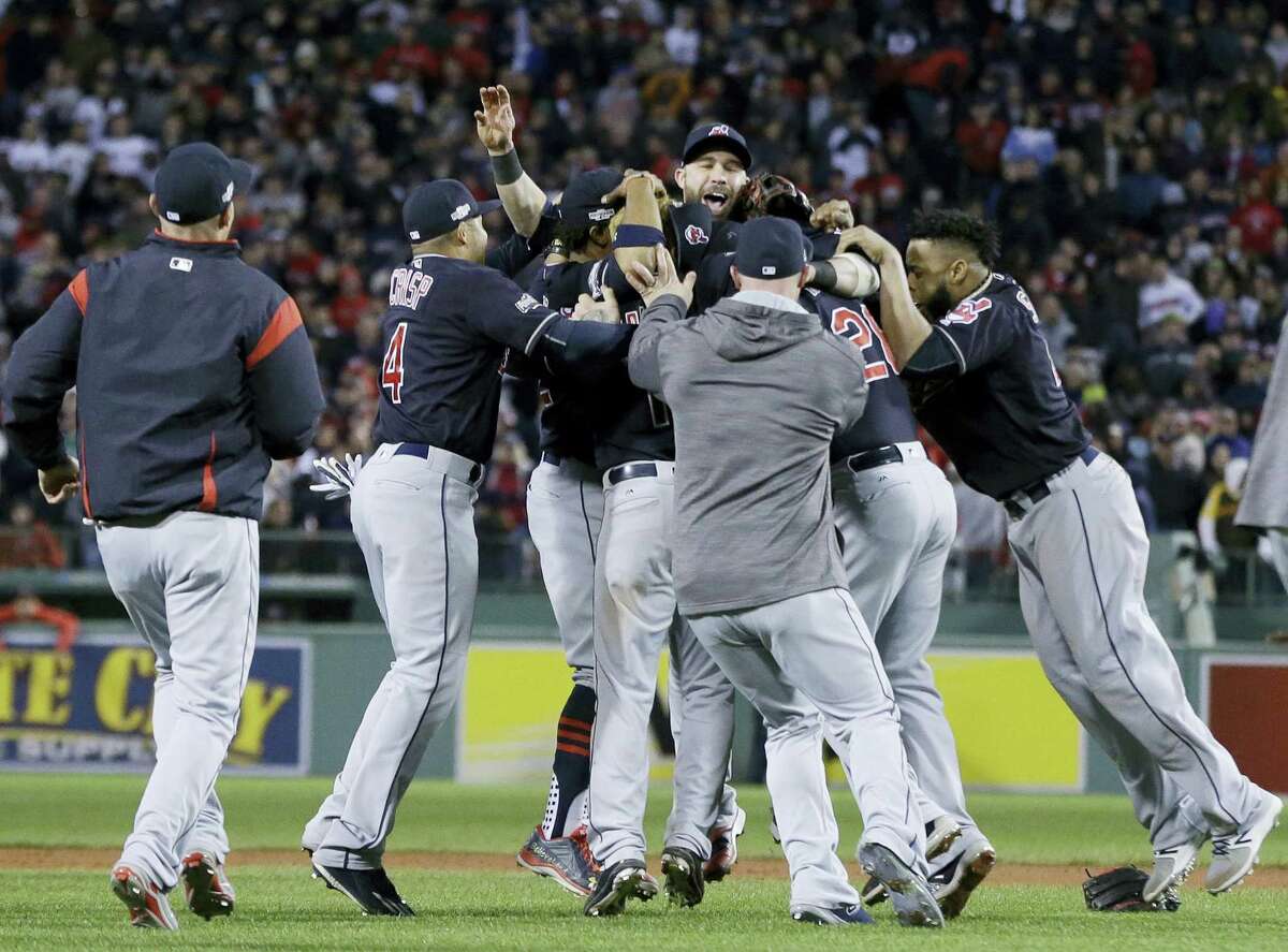 The Indians celebrate their win over the Red Sox on Monday.