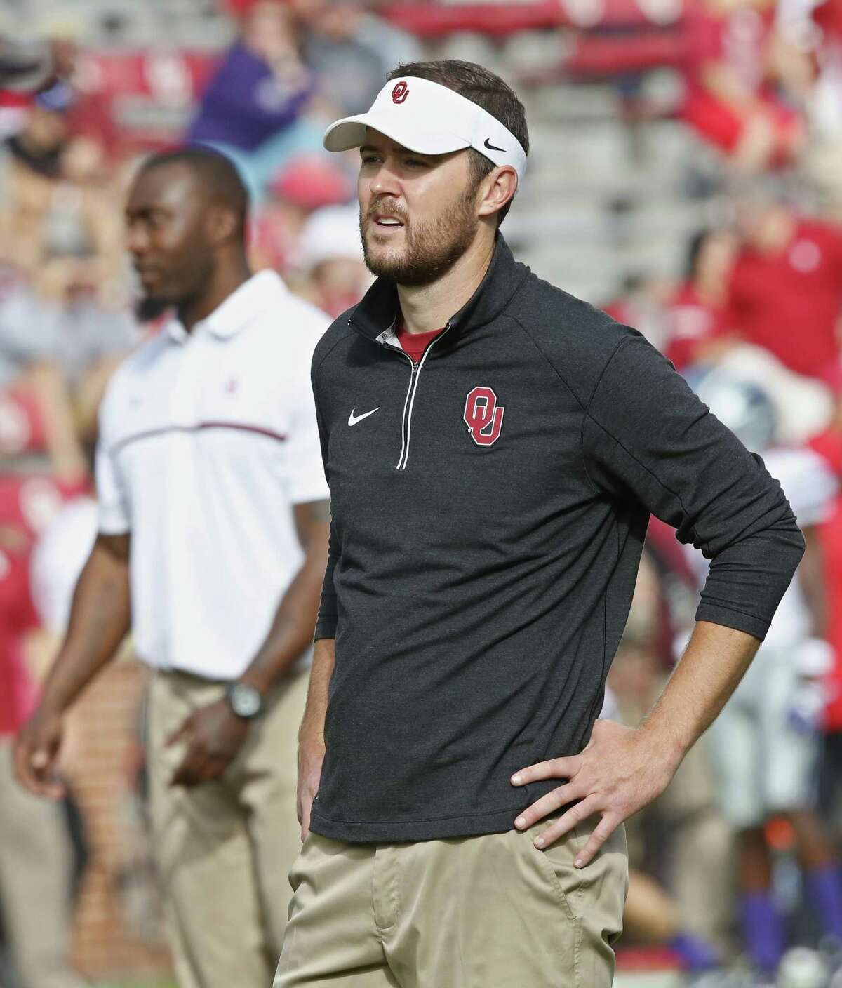 File-This Oct. 15, 2016, file photo shows Oklahoma offensive coordinator Lincoln Riley before an NCAA college football game between Kansas State and Oklahoma in Norman, Okla. LeachÂ?’s former Tech quarterbacks are gaining prominence as coaches at Big 12 programs. Riley recently was promoted from offensive coordinator to head coach at Oklahoma. Kliff Kingsbury has been the head coach at Texas Tech since 2013, and his offenses have been nearly unstoppable. Sonny Cumbie is entering his fourth season as TCUÂ?’s co-offensive coordinator, and his units with quarterback Trevone Boykin were among the best in college football. (AP Photo/Sue Ogrocki. File)