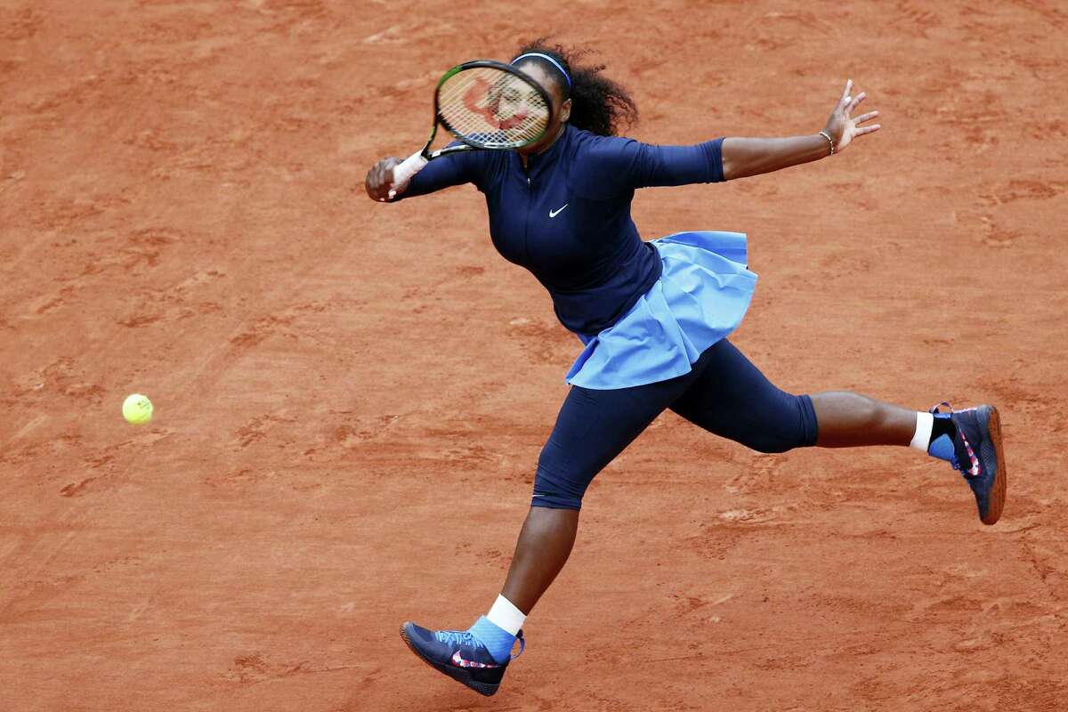 Serena Williams returns the ball during her semifinal match against Kiki Bertens at the French Open on Friday.