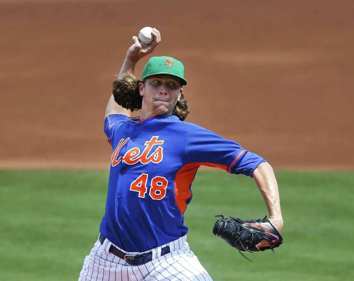 New York Mets starter Jacob deGrom works in the first inning of a spring training game Tuesday against the Miami Marlins in Port St. Lucie, Fla.