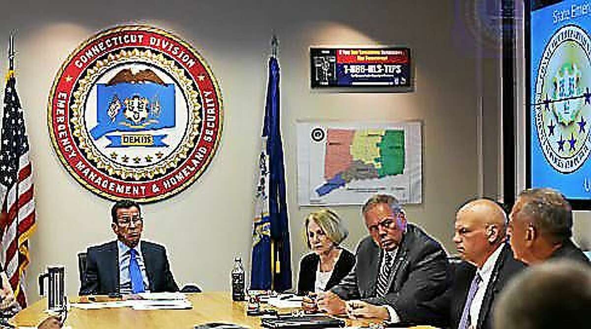 Hartford Mayor Pedro Segarra makes his pitch to Gov. Dannel Malloy during a meeting Monday at the Emergency Operations Center.