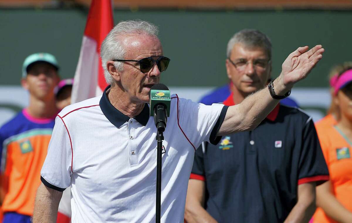 Tournament director Raymond Moore gestures while speaking at the BNP Paribas Open tennis tournament in Indian Wells, Calif. Moore quit as chief executive officer and tournament director late Monday night.