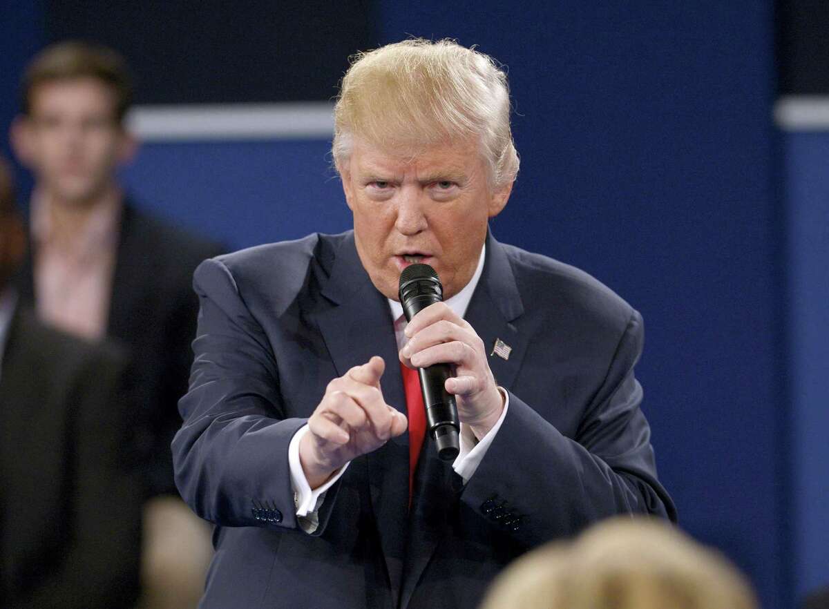 Republican presidential nominee Donald Trump speaks during the second presidential debate at Washington University in St. Louis, Sunday, Oct. 9, 2016. (Saul Loeb/Pool via AP)