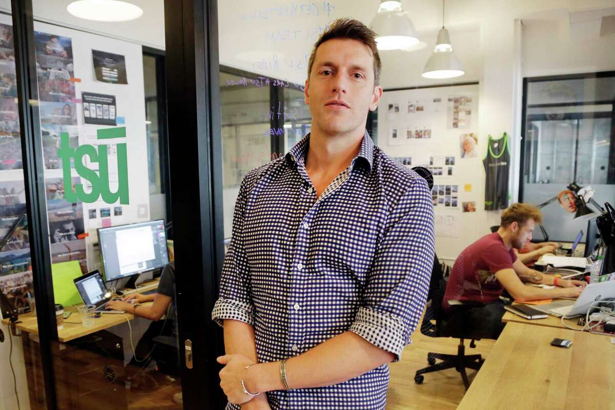 Sebastian Sobczak, CEO of Tsu.co, poses in his company’s New York office. Tsu.co is winning converts to its social network by paying them for their posts.