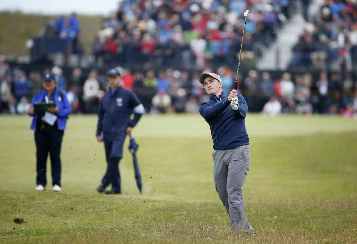 Ireland’s Paul Dunne plays his second shot on the 10th hole during the third round of the British Open on Sunday.