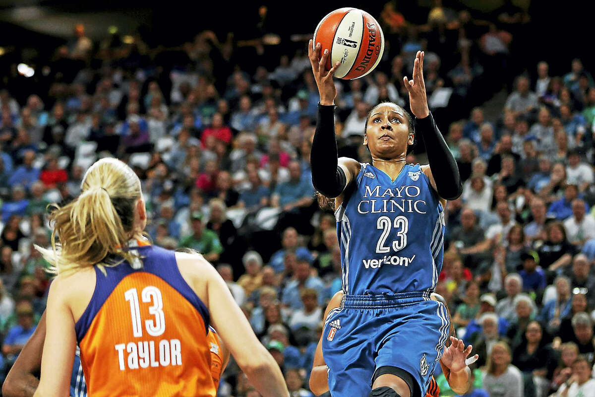 Maya Moore, right and the Minnesota Lynx will face off against the Los Angeles Sparks in the WNBA Finals beginning on Sunday.