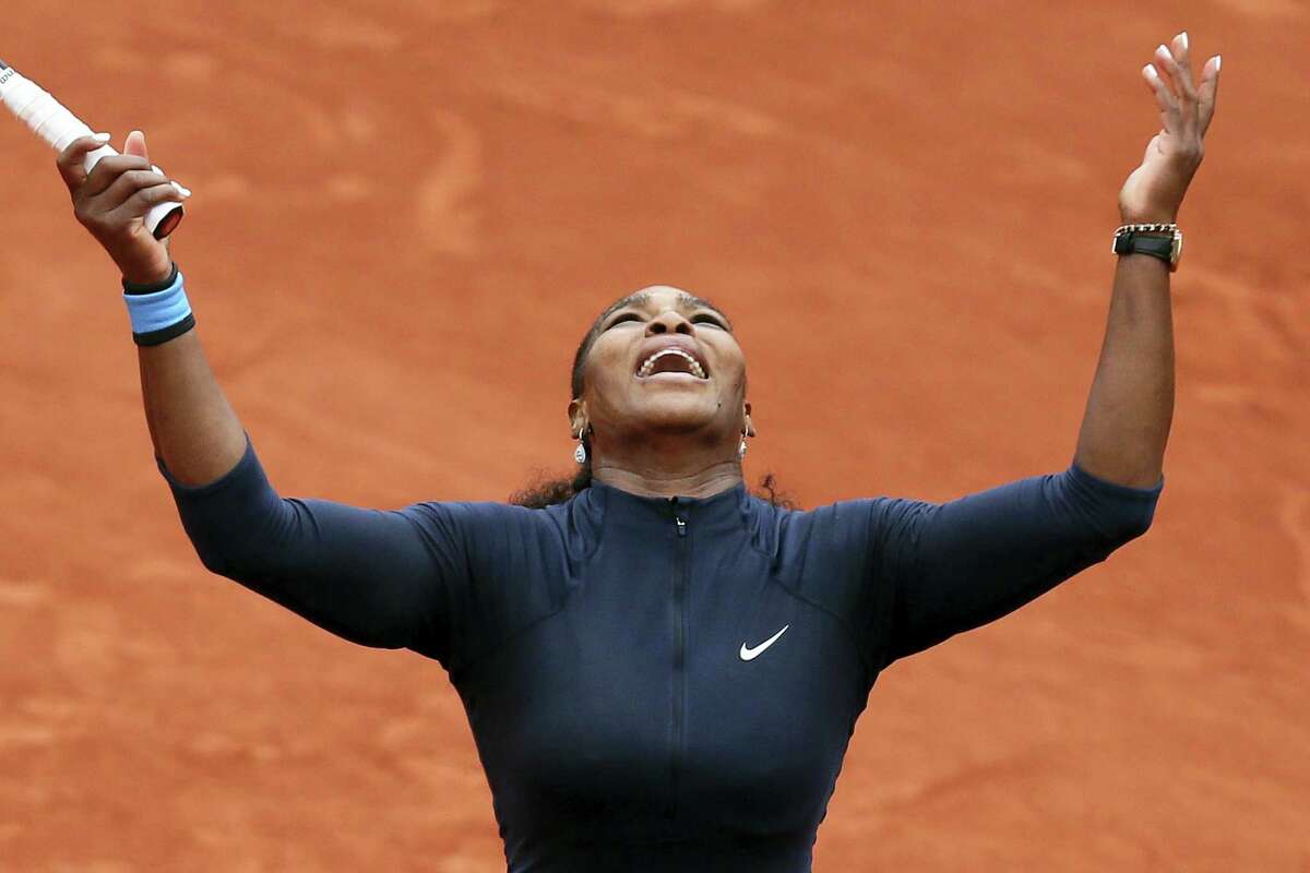 Serena Williams celebrates scoring a point in her quarterfinal match against Yulia Putintseva at the French Open on Thursday.