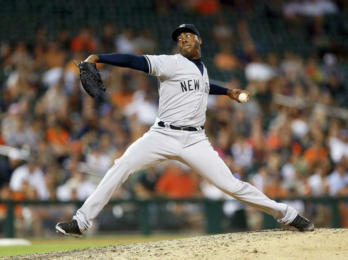 Yankees relief pitcher Aroldis Chapman throws against the Tigers during the ninth inning on Thursday.