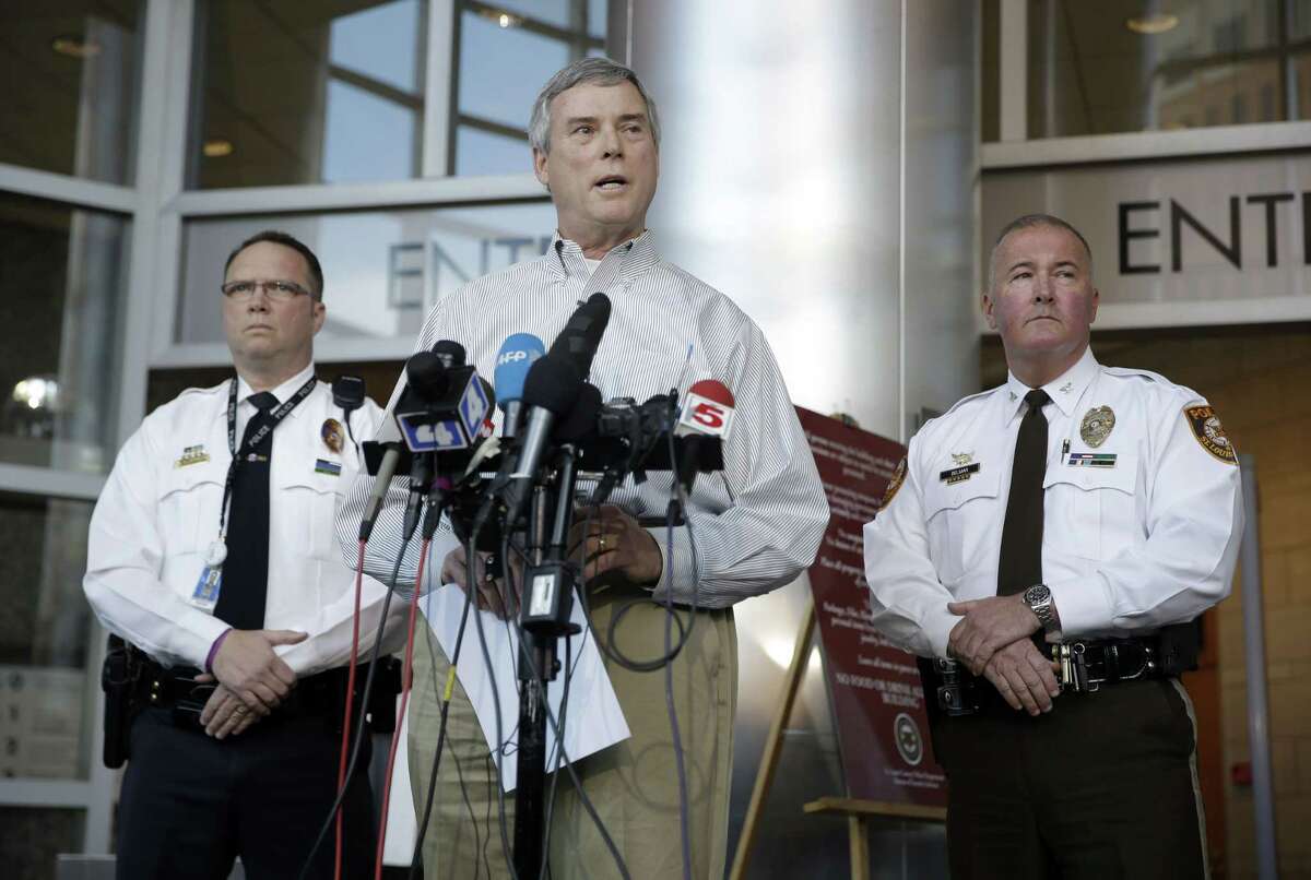 St. Louis County Prosecutor Robert McCulloch, center, speaks during a news conference along side St. Louis County Police Chief Jon Belmar, right, and Webster Groves Police Captain Stephen Spear, left, Sunday, March 15, 2015, in Clayton, Mo. McCulloch said 20-year-old Jeffrey Williams has been charged with two counts of first-degree assault in the shooting of two St. Louis-area officers.