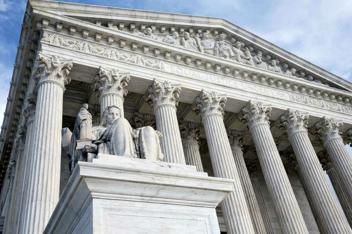 This Feb. 17, 2016 photo shows the Supreme Court in Washington. Challengers in two politically tinged cases at the Supreme Court this week face the seemingly insurmountable problem of being unable to count the five votes they need to prevail. The death of Justice Antonin Scalia has deprived conservatives of a reliable vote on a range of issues, and two of them are coming before the court.