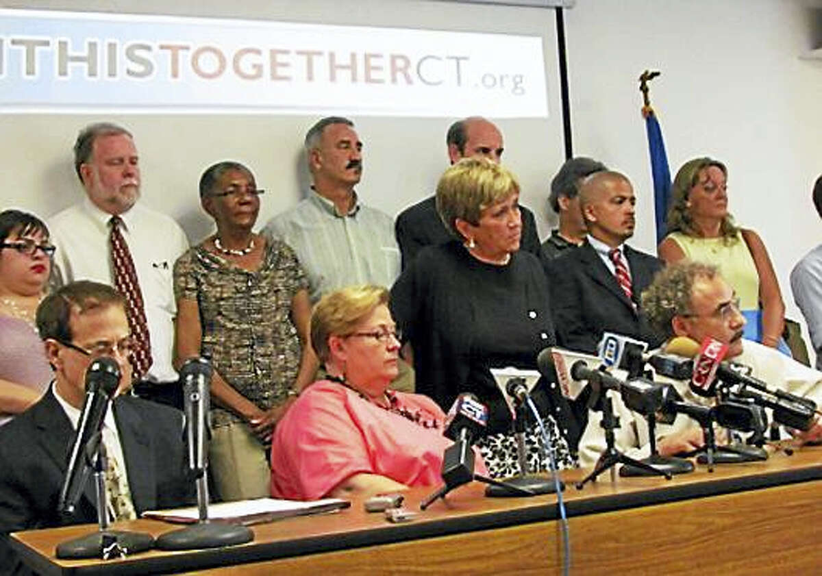 The heads of Connecticut’s labor unions following the signing of the 2011 labor contract.