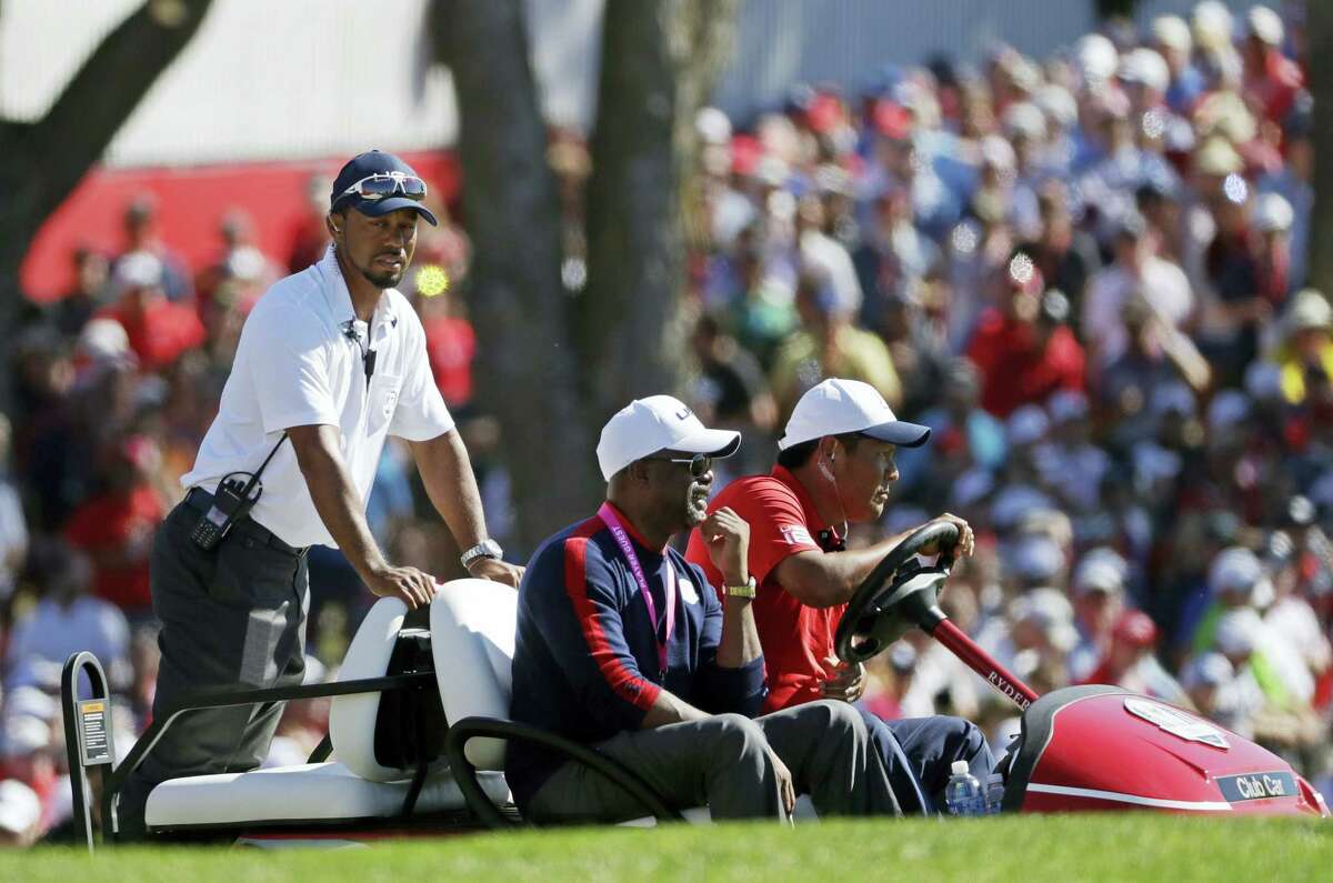 Tiger Woods watches from the first hole during a singles match at the Ryder Cup last week.