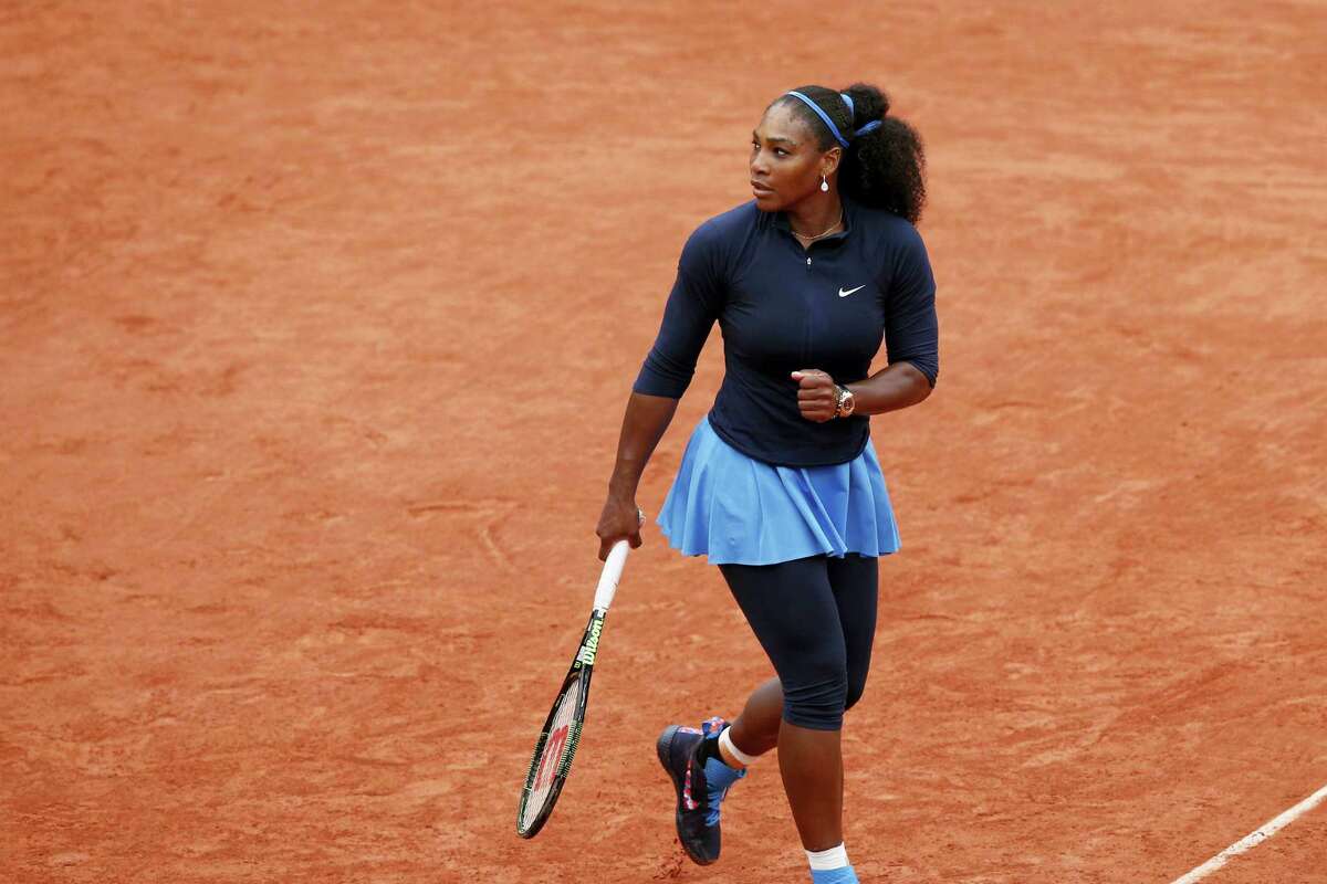 Serena Williams of the U.S. reacts as she defeats Ukraine’s Elina Svitolina during their fourth round match of the French Open tennis tournament at the Roland Garros stadium on June 1, 2016 in Paris.