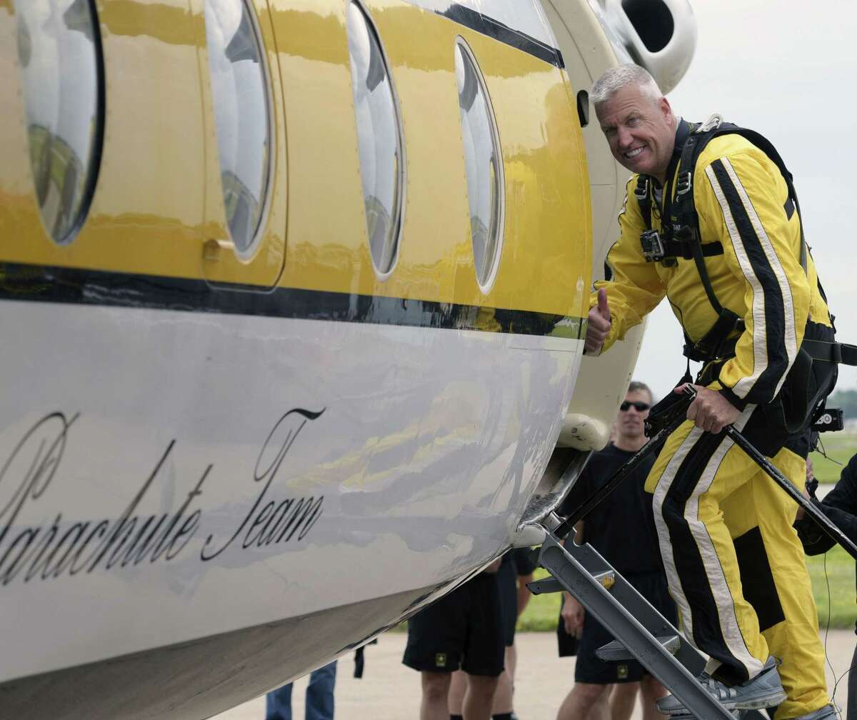 Buffalo Bills head coach Rex Ryan gives a “thumbs up” as he boards a plane for a parachute jump with the U.S. Army Golden Nights Parachute Team at Niagara Falls Air Force Base in Niagara falls, N.Y. on Friday.