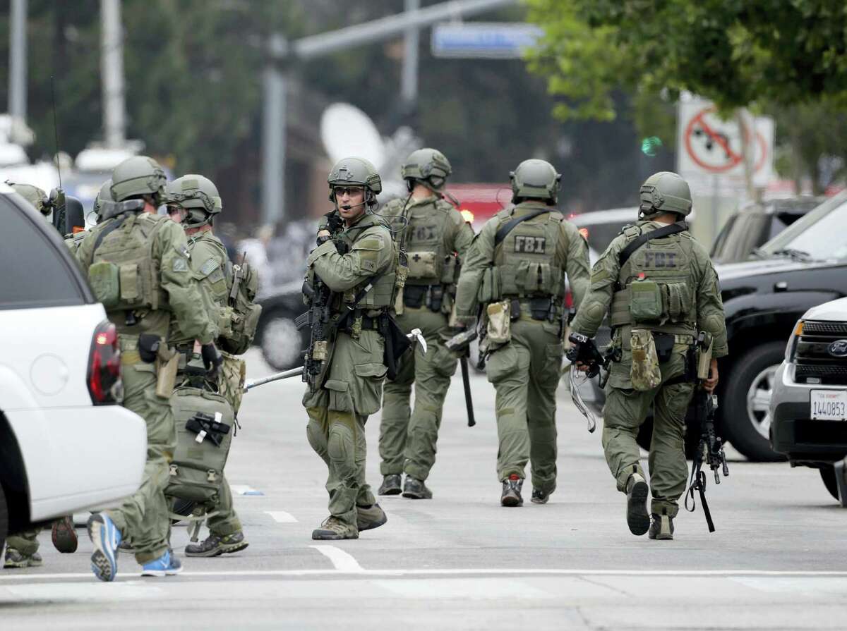 An FBI SWAT team arrives at the scene of a fatal shooting at the University of California, Los Angeles, Wednesday, June 1, 2016, in Los Angeles.