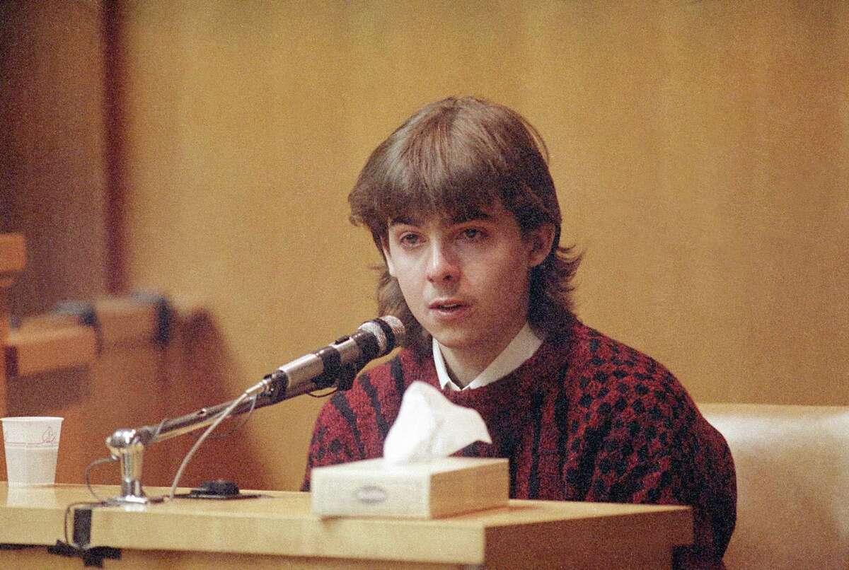 FILE - In this March 13, 1991 file photo, William Flynn, testifies on his 17th birthday how he shot Gregory Smart in the head and killed him, in court in Exeter, N.H. Smarts' widow Pamela Smart was convicted and sentenced to life without parole for conspiring with Flynn to kill her husband. Flynn pleaded guilty to killing her husband and has a parole hearing scheduled for Thursday, March 12, 2015. (AP Photo/Jim Cole, File)