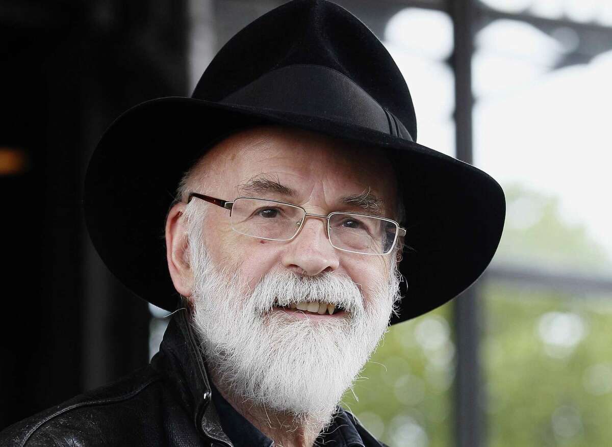 In this 2010 file photo, British author Terry Pratchett is seen at the Conservative party conference in Birmingham, England.