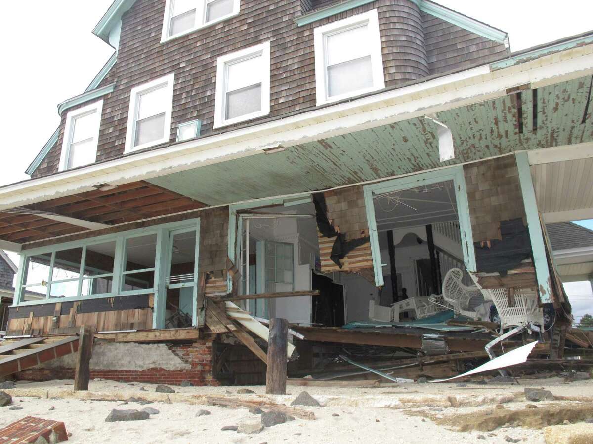An Oct. 31, 2012 photo shows an oceanfront home in Bay Head, N.J wrecked by Superstorm Sandy two days earlier. On Tuesday Mar. 10, 2015, New Jersey state senate president Steve Sweeney introduced a bill that would require the state to give individual estimates of when Sandy victims can expect to receive rebuilding aid, and how much it will be.(AP Photo/Wayne Parry)