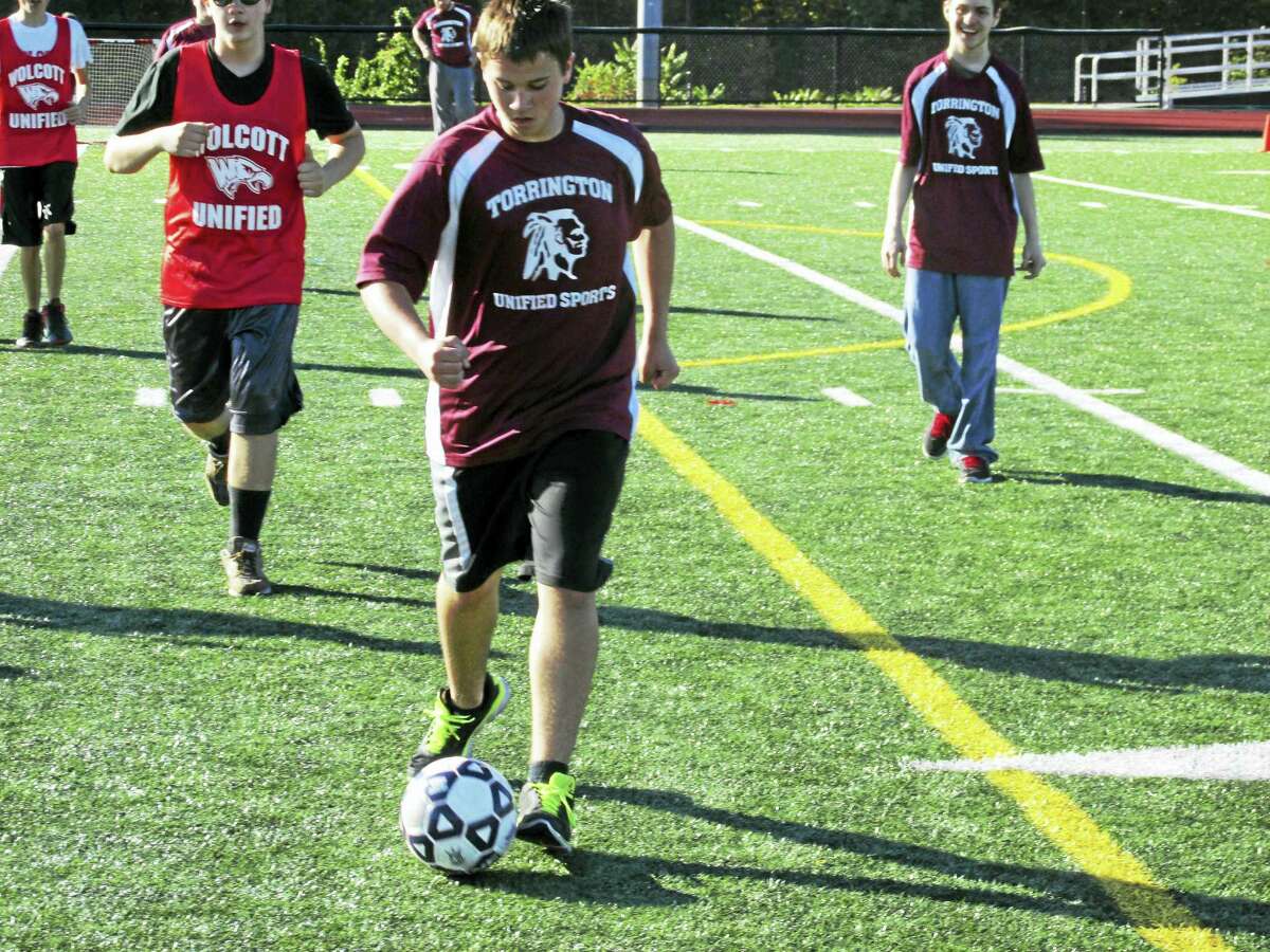 Torrington’s Adam Roy bears down for a goal at an NVL Unified Sports soccer game at Torrington High School Thursday afternoon. Seven NVL schools and well over 100 kids and adults took part in the tournament that Torrington Athletic Director Mike McKenna called “the best we’ve had so far” in the league’s ongoing Unified Sports program.