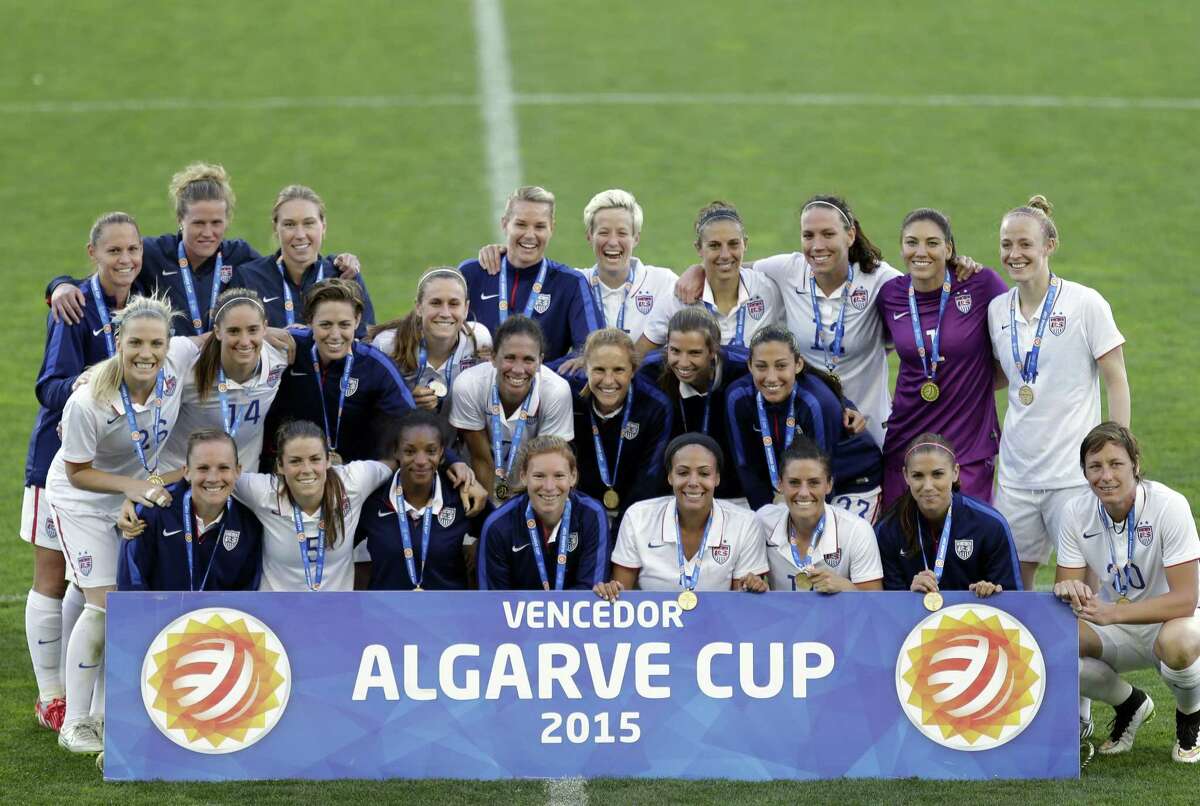 The United States team poses after winning the women’s soccer Algarve Cup Wednesday in Faro, Portugal.