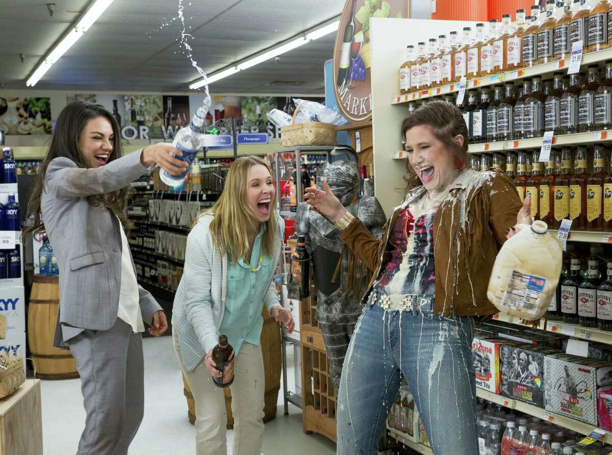 This image released by STX Productions shows, from left, Mila Kunis, Kristen Bell and Kathryn Hahn in a scene from, “Bad Moms.” The movie opens in U.S. theaters on July 29, 2016.