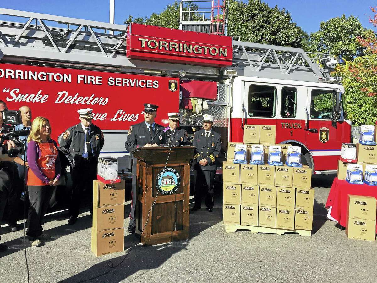 Ben Lambert - The Register Citizen Torrington firefighters launched a drive to equip city homes with free smoke and carbon dioxide detectors Thursday morning. Above, Chief Gary Brunoli speaks during the kickoff event.