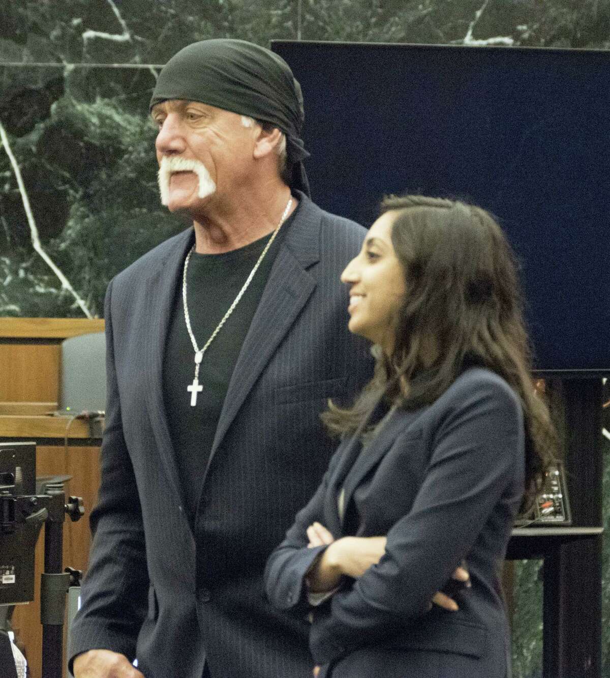 Former professional wrestler Hulk Hogan, left, along with attorney Seema Ghatnekar prepare to take a break just after the jury was handed Hogan’s case against Gawker Media for deliberations on Friday, March 18, 2016, in St. Petersburg, Fla. Hogan, whose given name is Terry Bollea, is suing Gawker for $100 million for posting a video of him having sex with his former best friend’s wife. Hogan contends the 2012 post violated his privacy.
