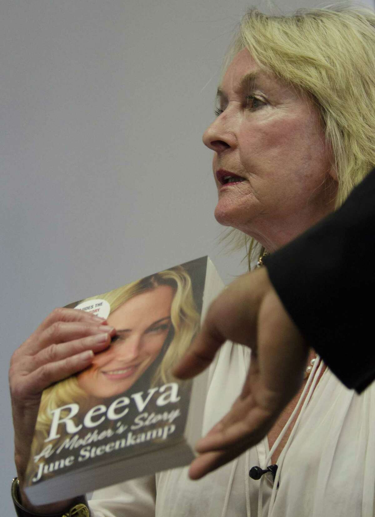June Steenkamp, the mother of the late Reeva Steenkamp who was shot dead by her boyfriend Oscar Pistorius in 2013, speaks at the launch of her book, ëReeva, A Mothers Story.í in Johannesburg Tuesday, March 10, 2015. Steenkamp said that she did not care about an upcoming appeal hearing by the star athlete. Pistoriusí lawyers will challenge a judge's decision to allow prosecutors to appeal the runner's negligent killing conviction later this week. (AP Photo/Shiraaz Mohamed)