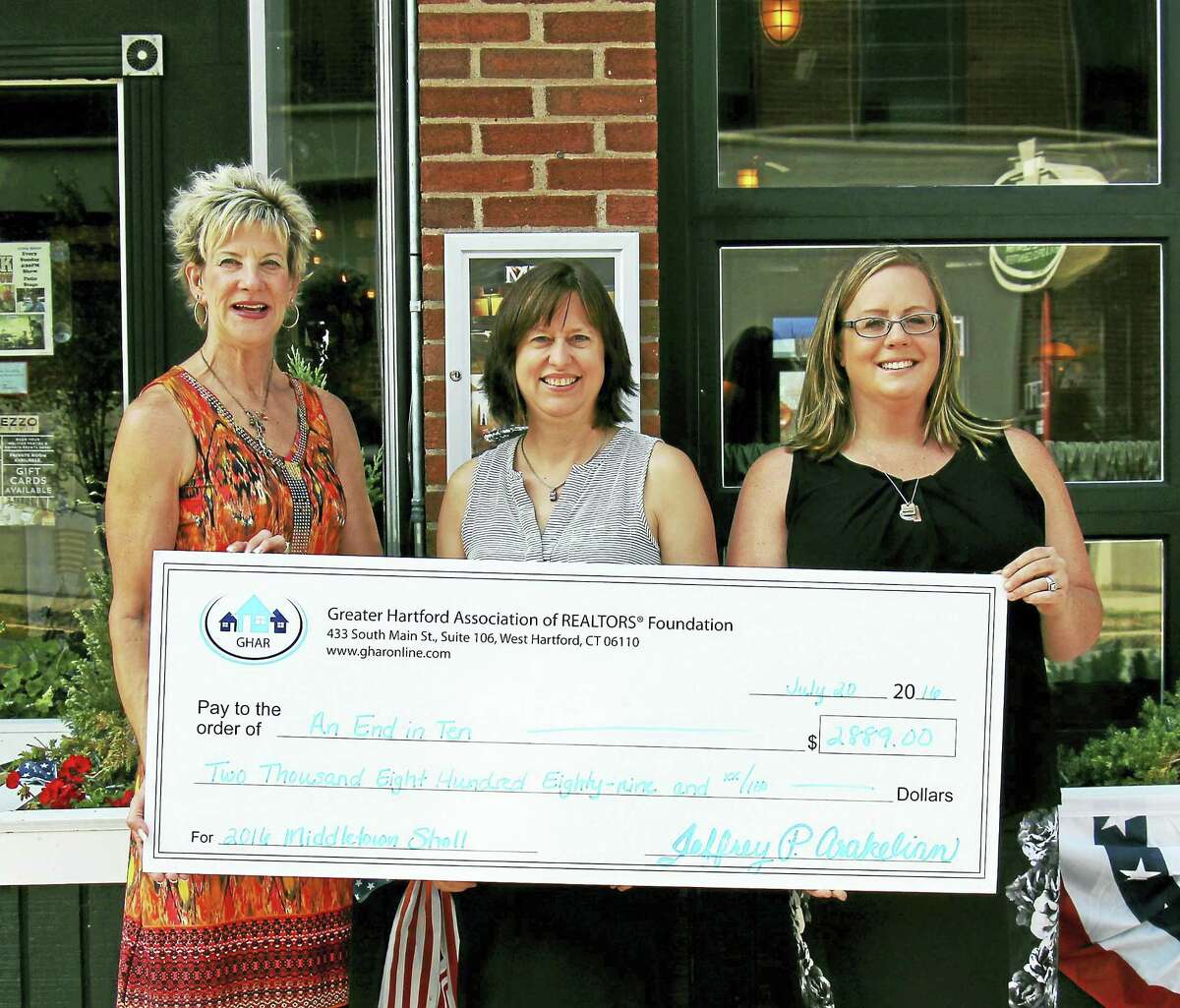 Contributed photo From left are Mary Beth Bain, event sponsor; Ann Foust of MCCHH; and Kaethe Everett, Committee Chair), at the GHAR fundraiser.