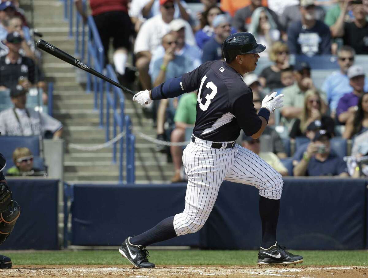 New York Yankees third baseman Alex Rodriguez follows through on a RBI single to score Brian McCann in the second inning of Monday’s game against the Tampa Bay Rays in Tampa, Fla.