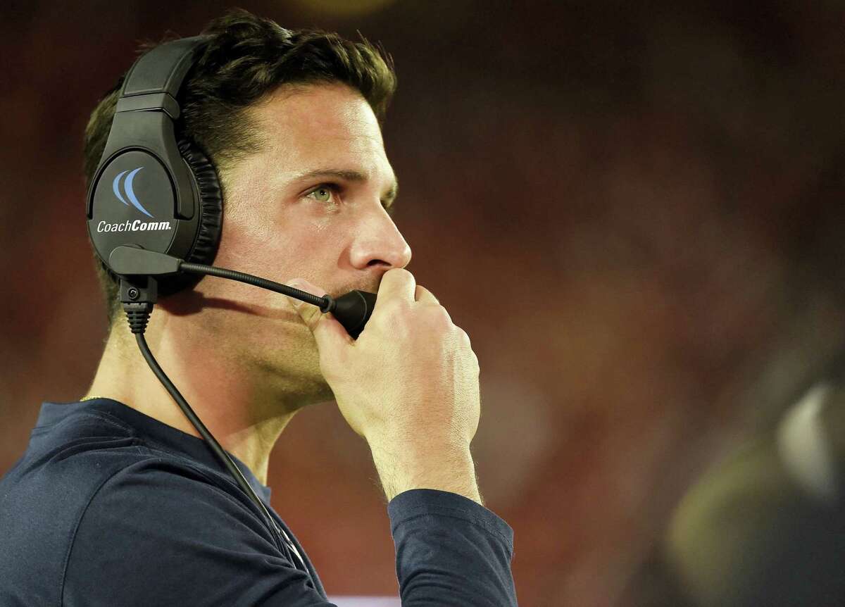 CHRISTIAN SMITH — THE ASSOCIATED PRESS UConn head football coach Bob Diaco watches from the sideline in the second half against Houston. Diaco wants to get Ansonia’s Arkeel Newsome many more carries than the six he got against Houston.