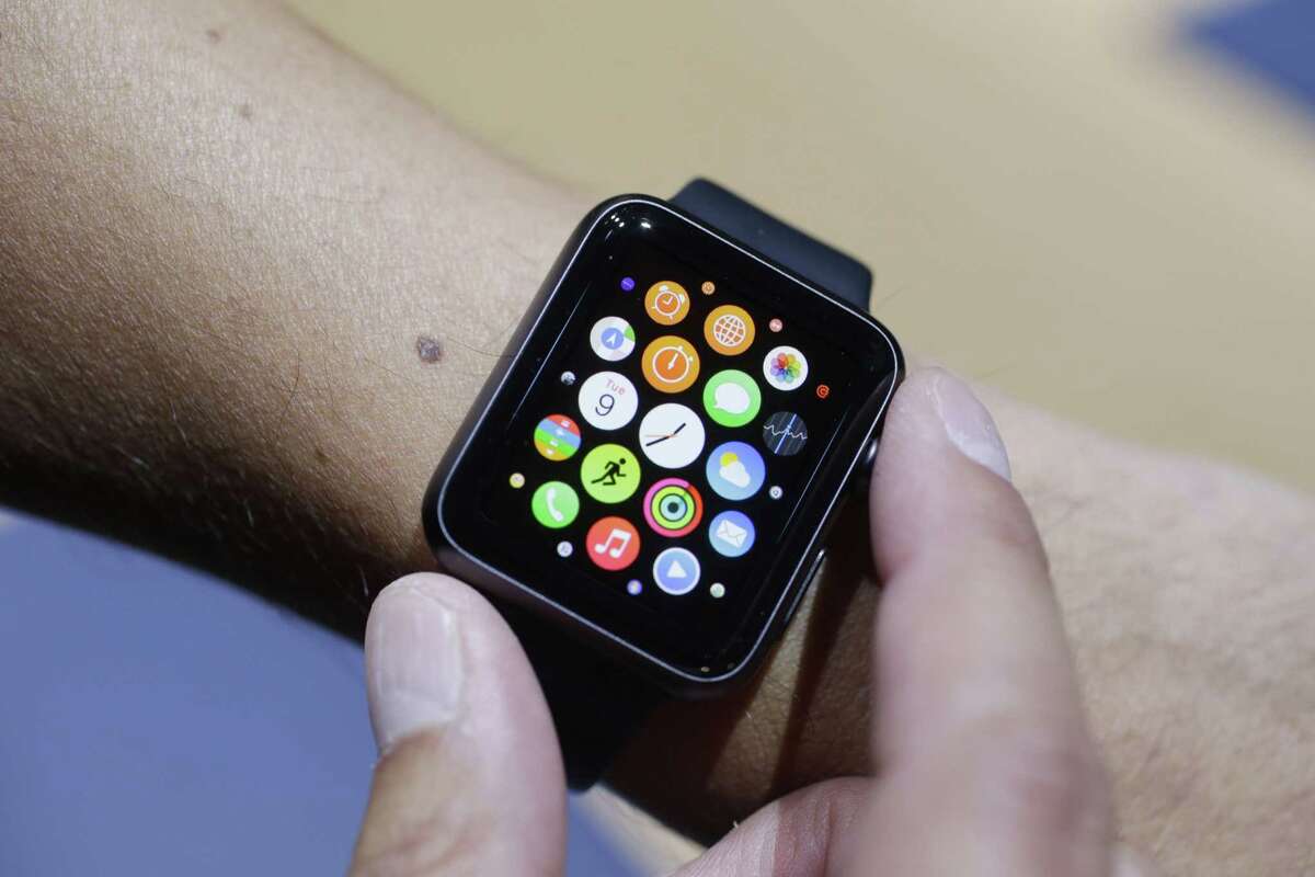 In this Sept. 9, 2014 photo, the new Apple Watch is modeled during a media event in Cupertino, Calif.