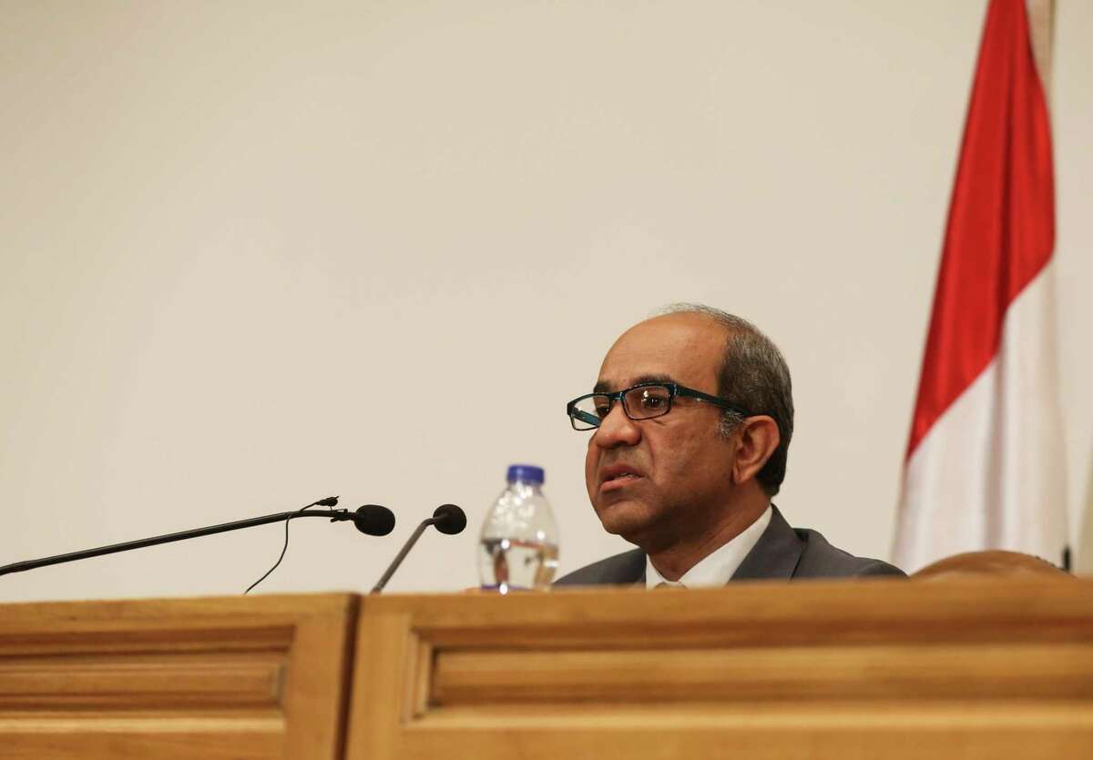 Ayman el-Muqadem, the head of the investigation team on a Russian plane crash last week in Egypt’s Sinai, speaks during a press conference at the Aviation Ministry in the Nasr City neighborhood of Cairo, Egypt, Saturday, Nov. 7, 2015. El-Muqadem said a noise was heard in the last second of the cockpit voice recording from the plane that took off from Egypt’s Red Sea resort of Sharm el-Shiekh, killing all 224 people onboard. He said an analysis of the noise was underway to identify its nature.