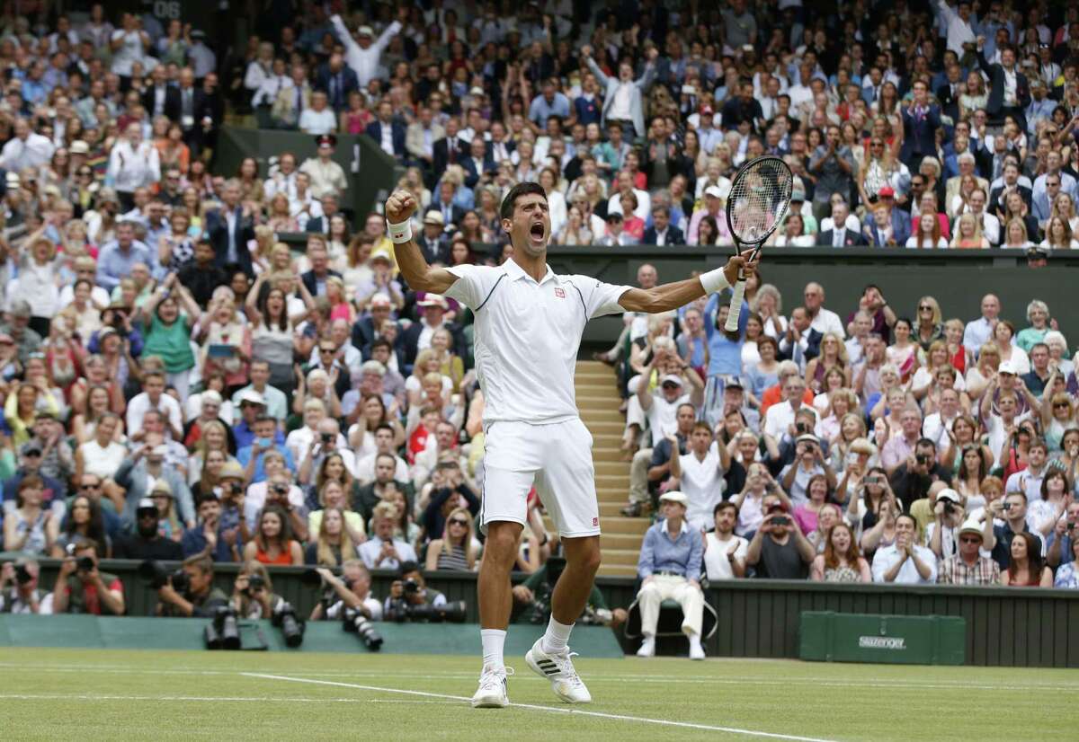 Novak Djokovic of Serbia celebrates winning the men’s singles final against Roger Federer of Switzerland at Wimbledon Sunday.