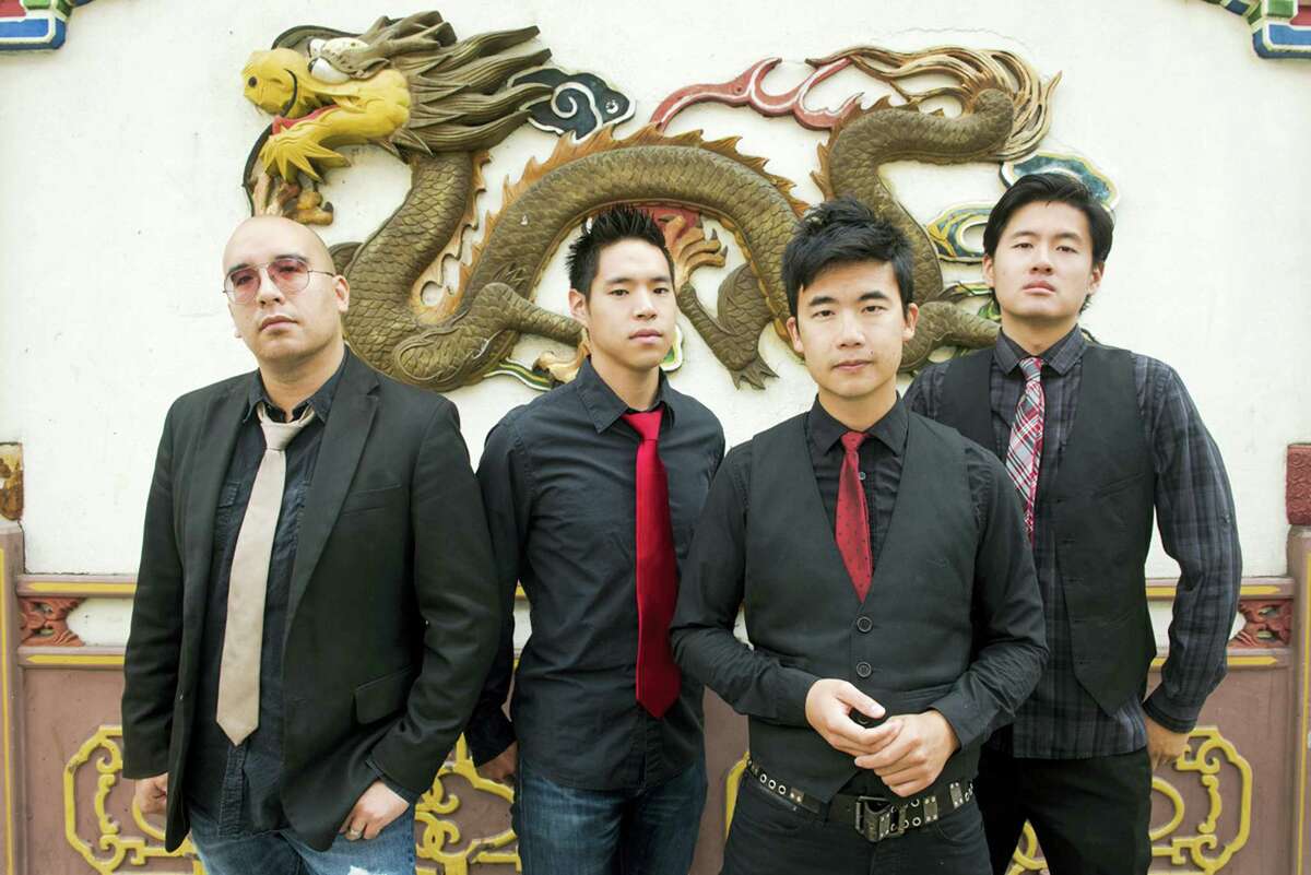 This photo provided by Anthony Pidgeon, taken Aug. 21, 2015, shows the Asian-American band The Slants, from left, Joe X Jiang, Ken Shima, Tyler Chen, Simon “Young” Tam, Joe X Jiang in Old Town Chinatown, Portland, Ore. The Supreme Court will hear a First Amendment challenge over the government’s refusal to register offensive trademarks in a case that could affect the Washington Redskins. The justices agreed Thursday, Sept. 29, 2016, to take up a dispute involving an Asian-American rock band called the Slants, but did not act on a separate request to hear the higher-profile Redskins case at the same time.