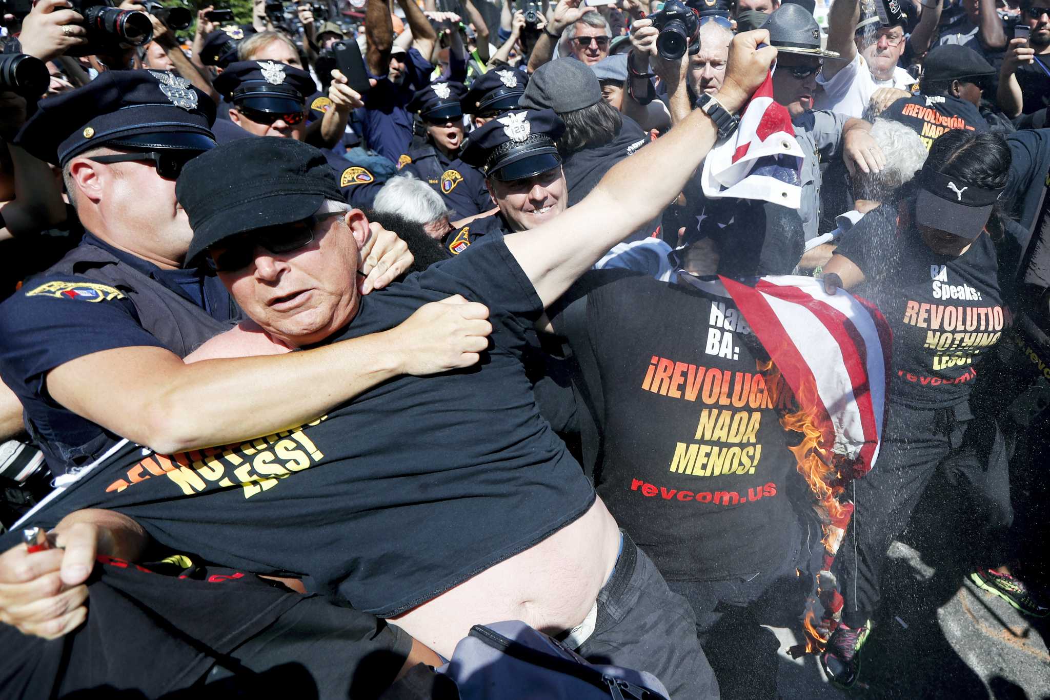 ‘You’re on fire, stupid,’ cop tells protester outside GOP convention