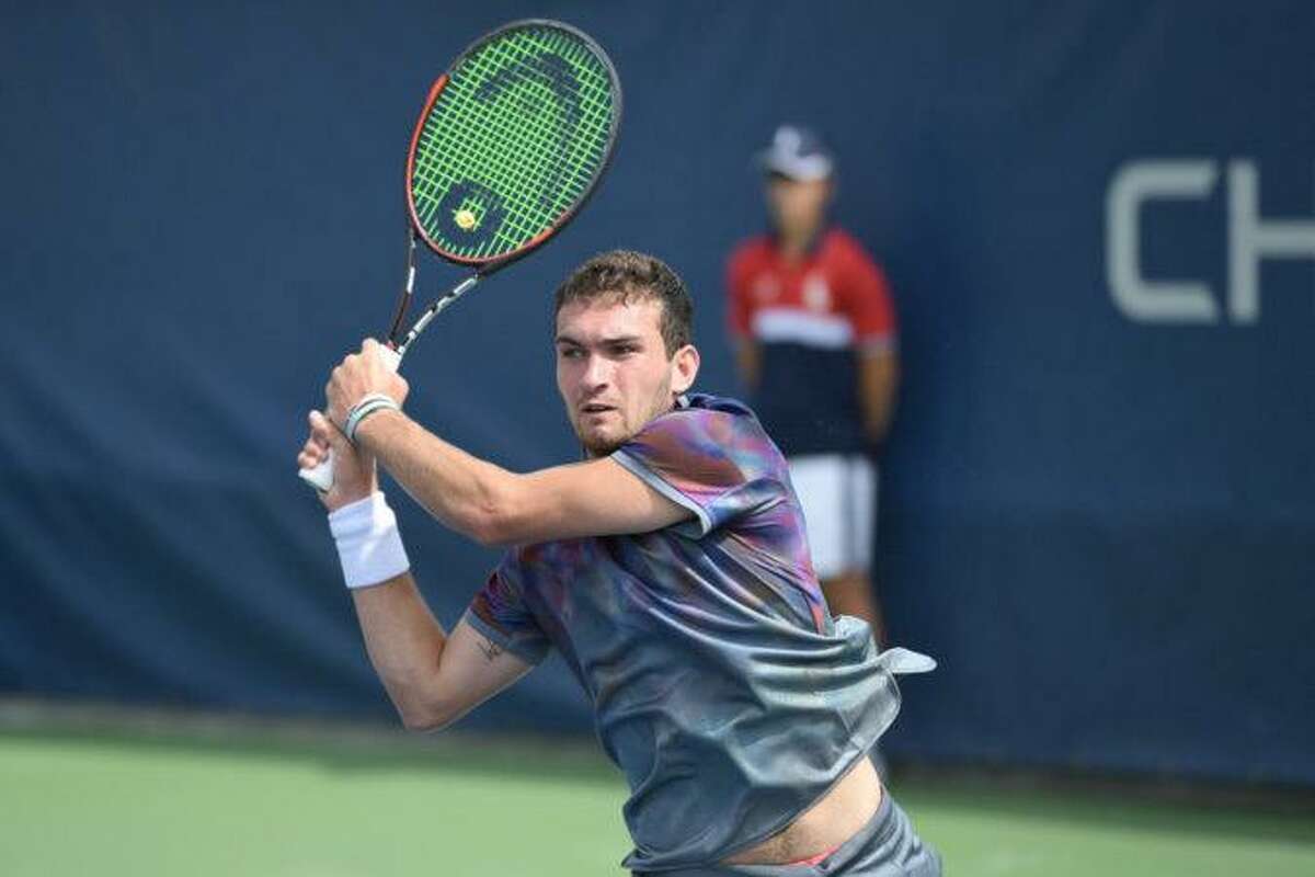 Greenwich native William Blumberg returns a shot during his match against Cem Ilkel of Turkey during a US Open qualifying round match Wednesday at the USTA Billie Jean King National Tennis Center in Flushing Meadows, N.Y.
