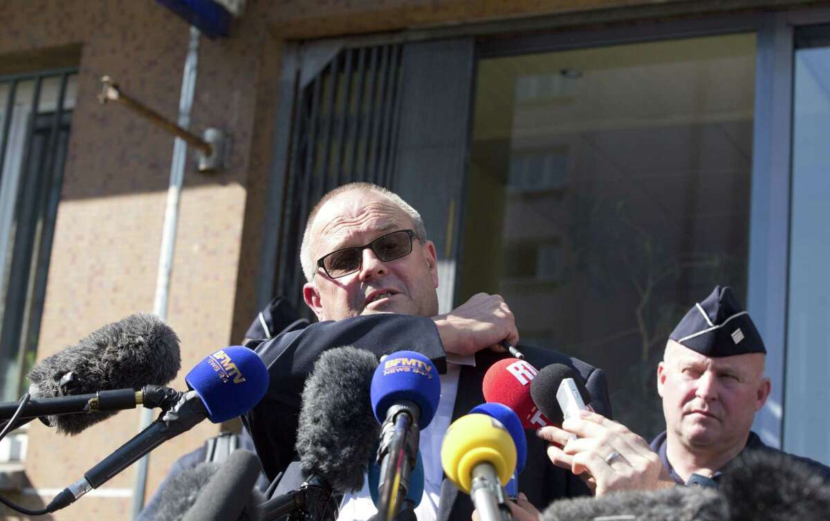 Britain’s Chris Norman speaks with the media at the police headquarters in Arras, northern France, Saturday, Aug. 22, 2015. A gunman prepared to open fire with an automatic weapon on a high-speed train traveling from Amsterdam to Paris Friday, wounding several people before being subdued by passengers, officials said. Norman, along with two others, rushed the gunman and held him until police arrived.