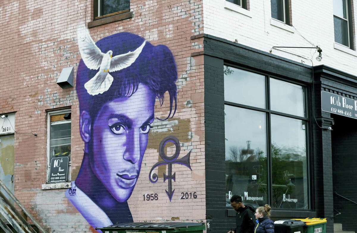 A mural honoring the late rock star Prince adorns a building in the Uptown area of Minneapolis Thursday, April 28, 2016, Prince died last week at his Paisley Park home at the age of 57. An investigation into his death continues.