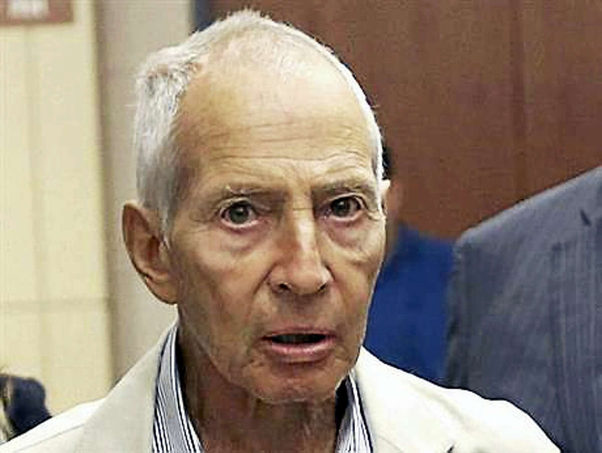 n this Aug. 15, 2014, file photo, New York City real estate heir Robert Durst leaves a Houston courtroom. New Orleans Federal Judge Kurt Engelhardt on Wednesday, April 27, 2016, approved a plea agreement for Durst to serve 7 years and 1 month in prison on a weapons charge. Durst still faces a separate murder charge in California.