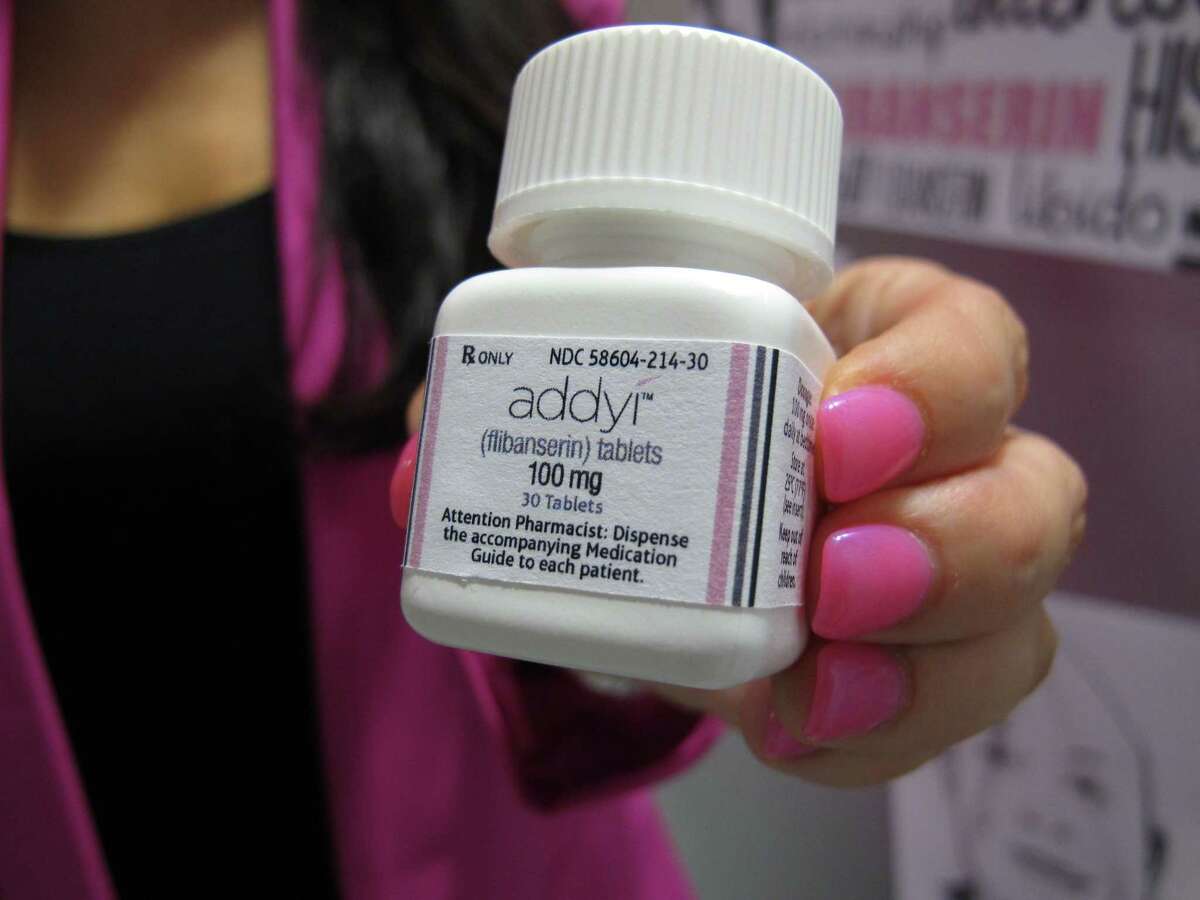 Sprout Pharmaceuticals CEO Cindy Whitehead holds a bottle for the female sex-drive drug Addyi at her Raleigh, N.C., office on Aug. 15, 2015. After two rejections, the U.S. Food and Drug Administration gave approval Tuesday for the drug, also known as flibanserin, as a treatment for hypoactive sexual desire disorder, a first for women.