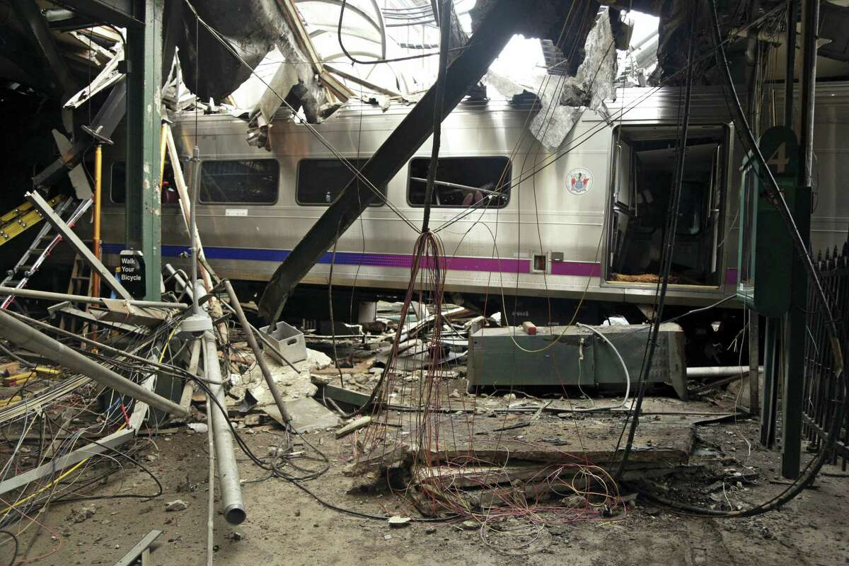 This Oct. 1, 2016, file photo provided by the National Transportation Safety Board shows damage from a Sept. 29, 2016, commuter train crash that killed a woman and injured more than 100 people at the Hoboken Terminal in Hoboken, N.J. Thomas Gallagher, the engineer of the commuter train that slammed into the station going double the 10 mph speed limit, suffered from sleep apnea that had gone undiagnosed, two U.S. officials told The Associated Press on Wednesday, Nov. 16, 2016.