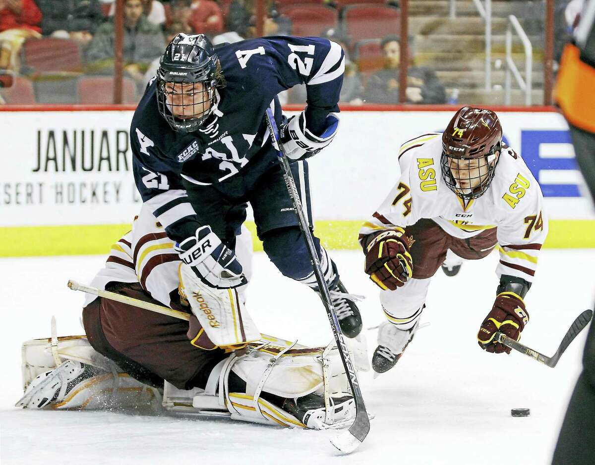 Yale’s John Hayden (21) was elected captain for the Yale hockey team.