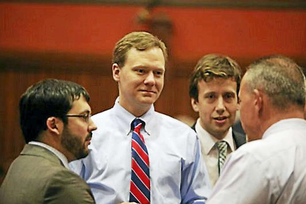 Rep. Matthew Ritter with his colleagues after the vote