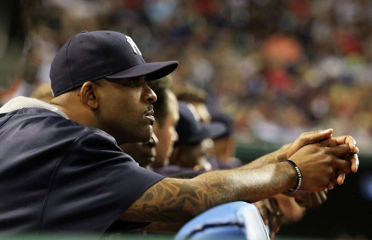 New York Yankees’ starter CC Sabathia looks on from the dugout during Thursday’s game against the Indians in Cleveland.