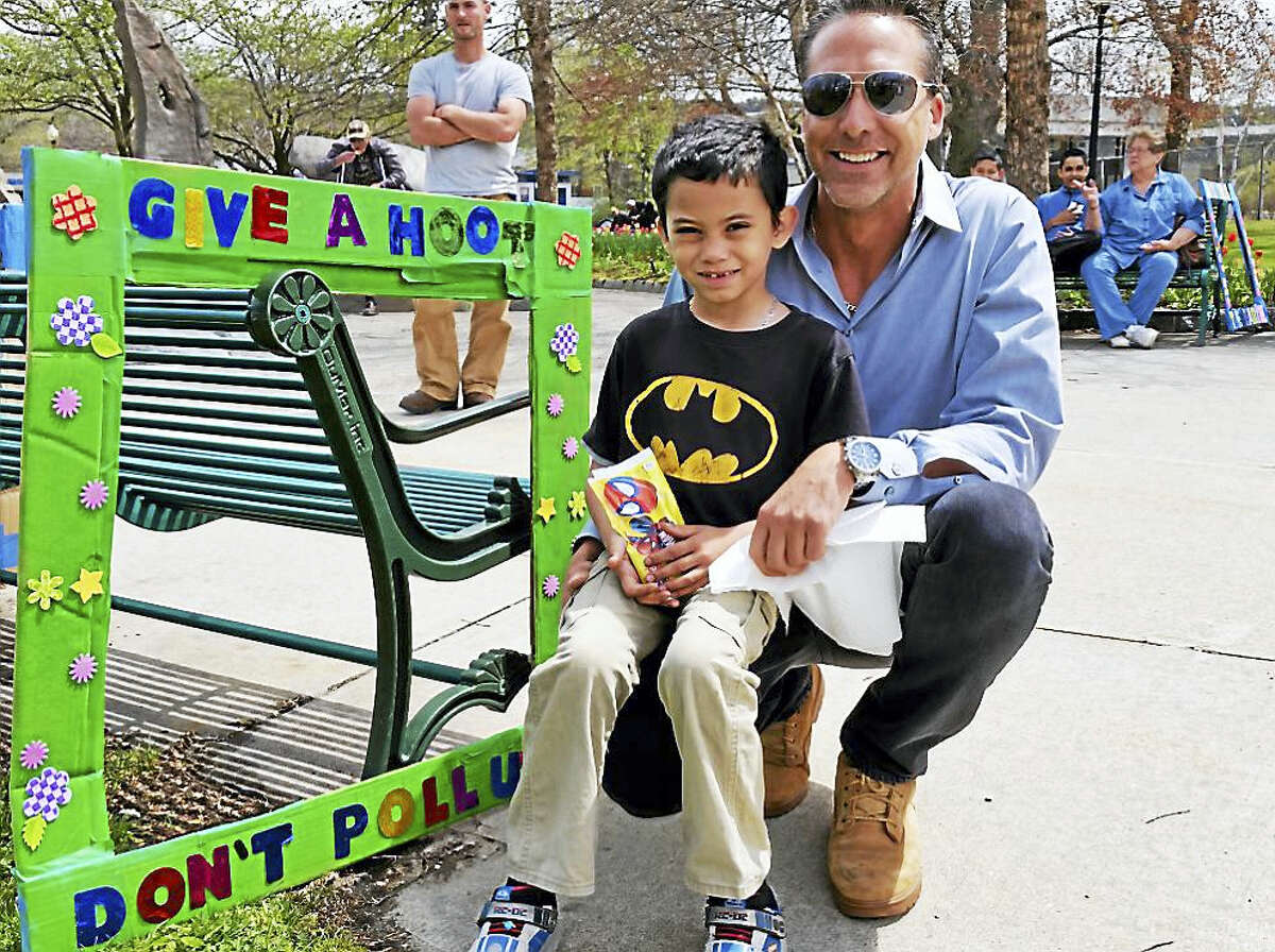 Mike Venghaus and Mike, Jr., 6, both of Torrington, participated in the Torrington Conservation Commission’s Earth Day Celebration Saturday morning. The event, one of thousand such celebrations held worldwide to demonstrate support for environmental protection, saw about 107 local people organized at Coe Memorial Park in Torrington picking up litter in various Torrington neighborhoods from 9 a.m. to noon and later enjoying a free picnic, games, and a martial-arts demonstration in the Park.