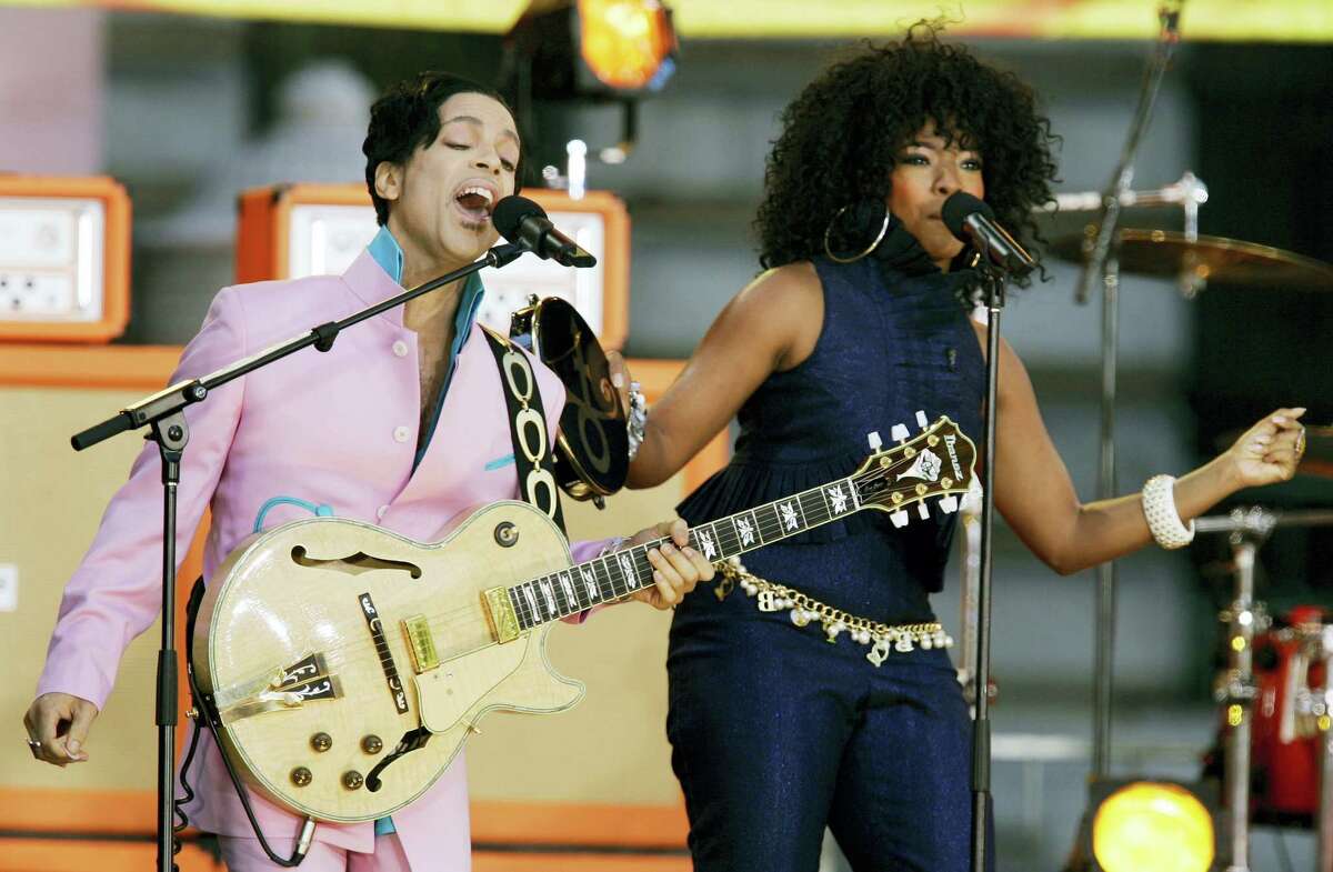 Musician Prince performs on stage with singer Tamar during ABC’s “Good Morning America” summer concert series in New York, Friday, June 16, 2006.