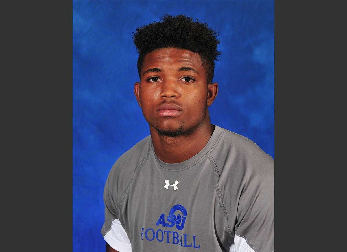 This undated file photo provided by Angelo State University shows Christian Taylor. Arlington officer Brad Miller who killed Taylor, an unarmed college football player, during a suspected burglary at a Texas car dealership was fired Aug. 11, 2015 for making mistakes that the city’s police chief said caused a deadly confrontation that put him and other officers in danger.